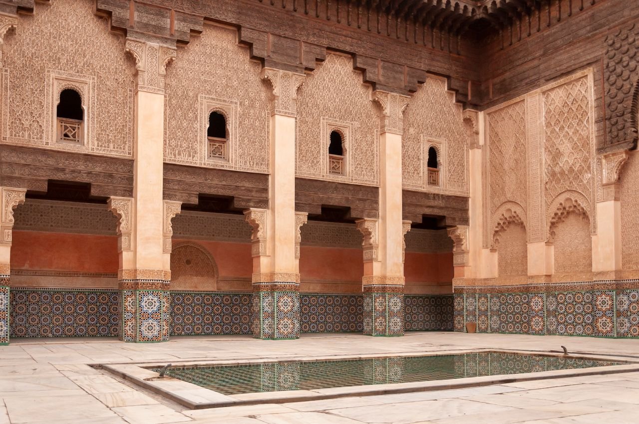 Courtyard of the Ben Youssef Madrasa with carved arches