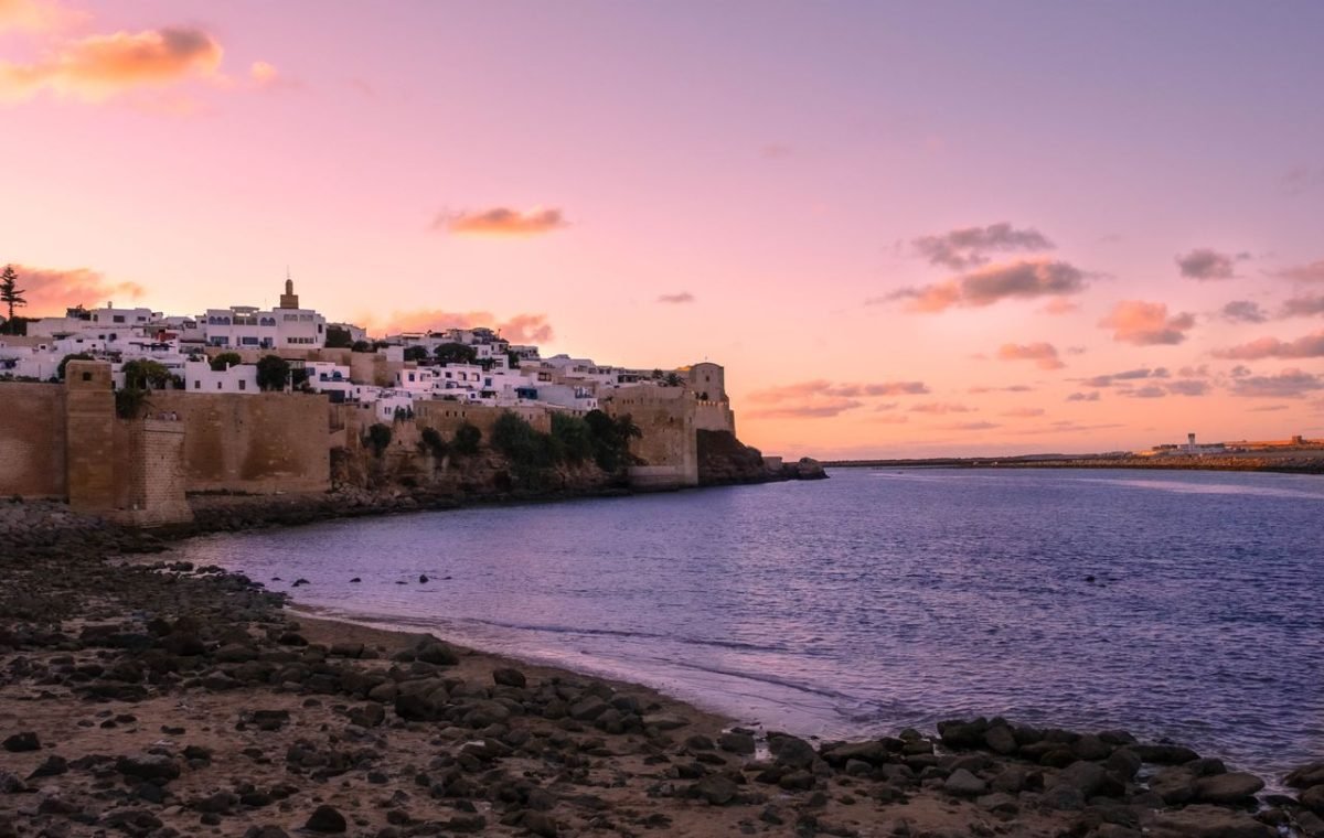 Sunset over the medina of Rabat and the ocean, on a day trip from Fes